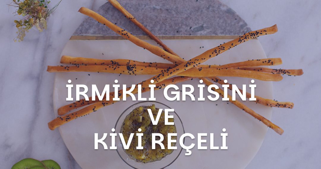 Tabağın üzerindeki grisini ve tabağın üzerindeki kasenin içerisindeki kivi reçeli